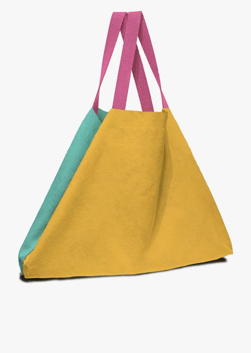 Large format bag in green and mustard colors, with fuchsia handles